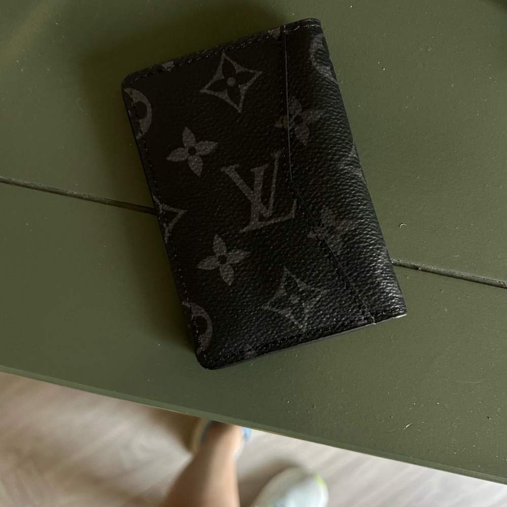 Authentic Louis Vuitton men’s pocket organizer.